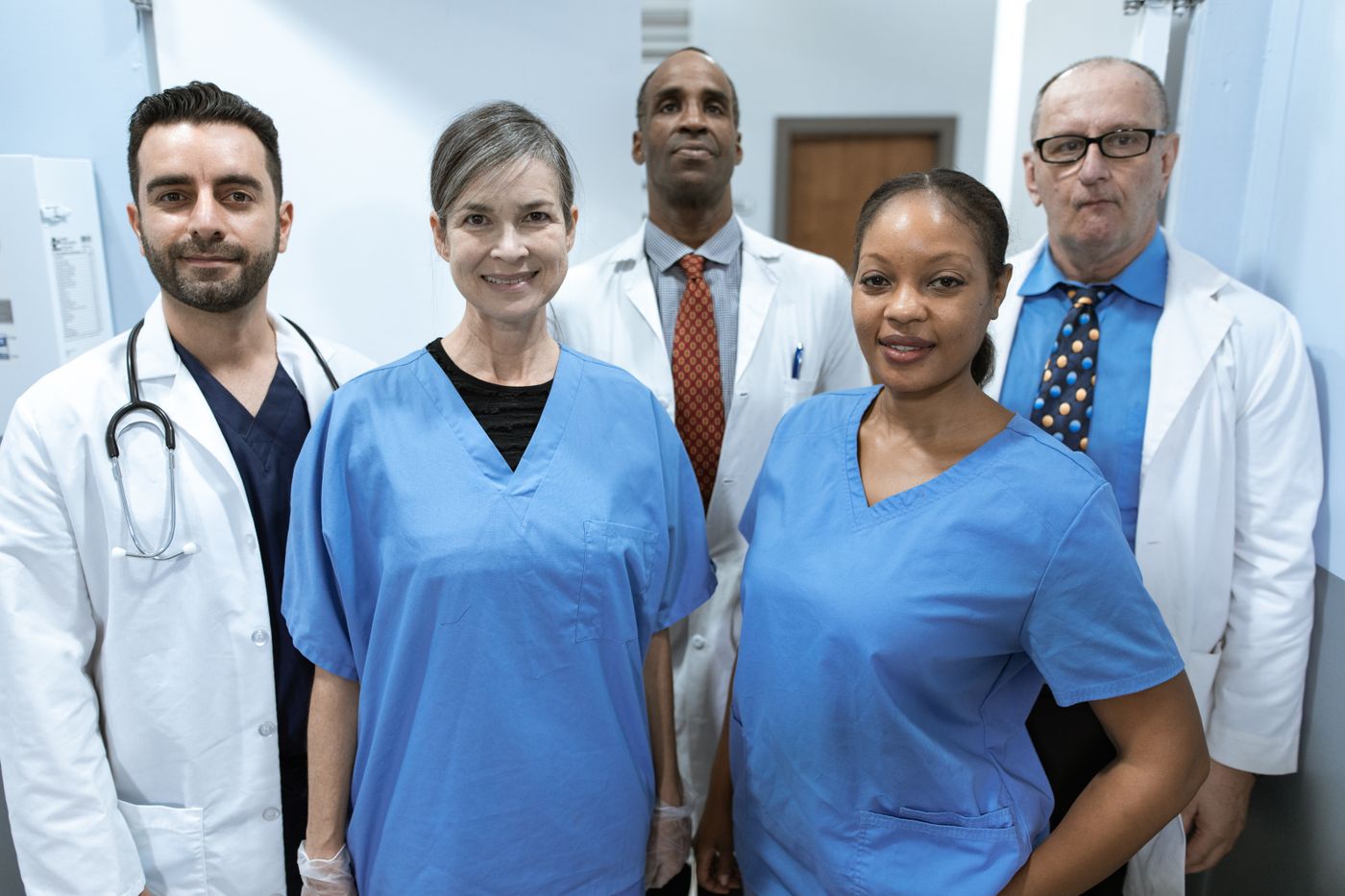 Healthcare professionals smiling at the camera